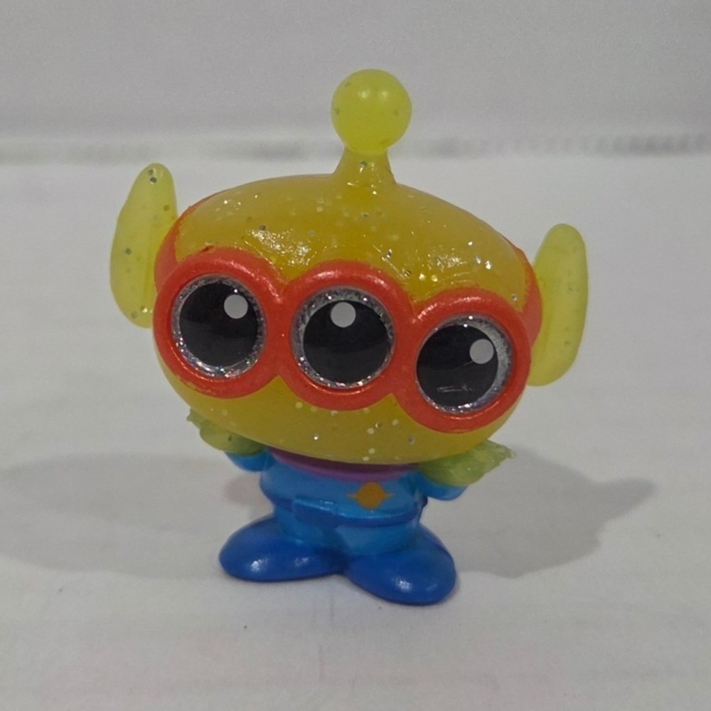 Disney Doorables Toy Story Alien Glitter Translucent Mini Figure Red Glasses